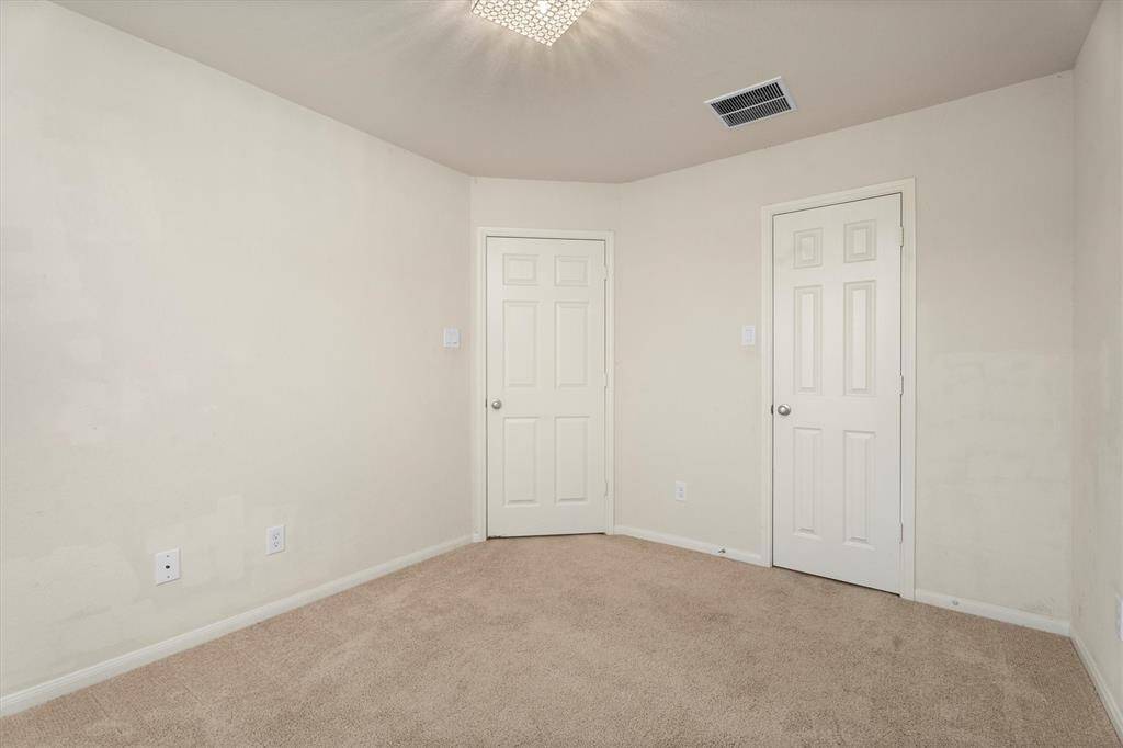 2nd Bedroom has a nice closet and opens to a hall with the 3rd bedroom and 2nd bathroom