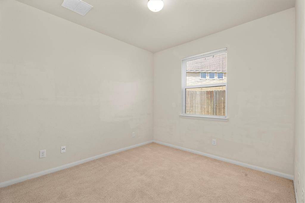4th Bedroom is located on the first floor.  This would be great for a guest bedroom or for multi-generational living!