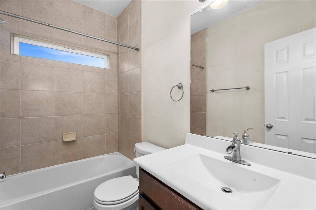 3rd full bath is located on the first floor near the 4th bedroom