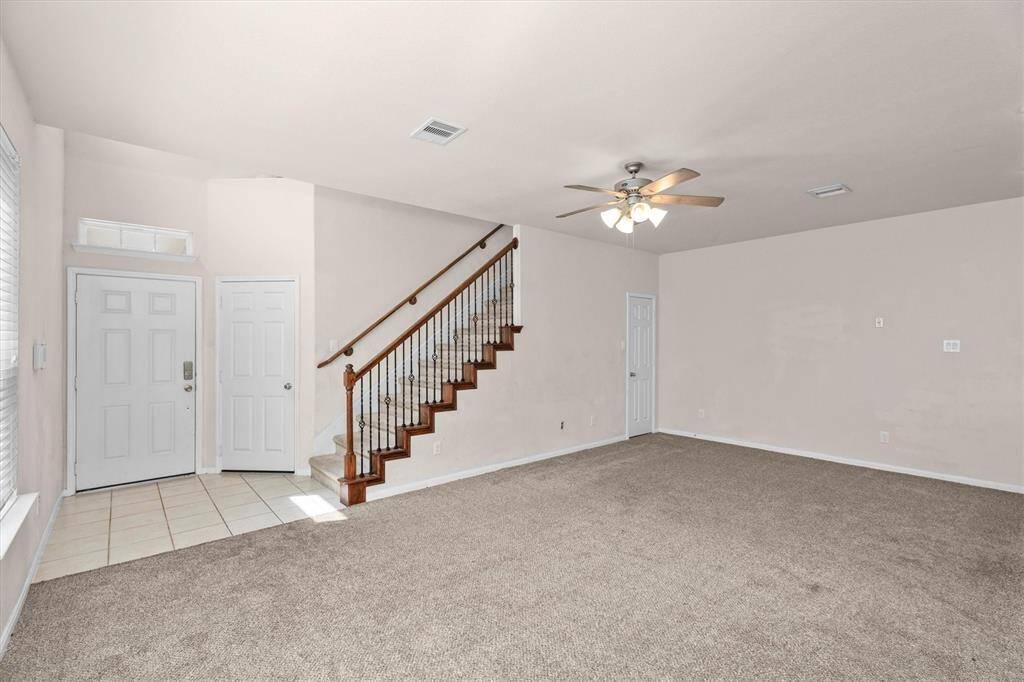 Nice entry way from front door and garage! Entry way ceiling is 2 stories high!