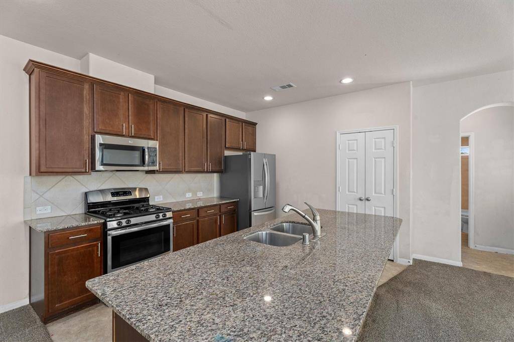 Tile backsplash and stainless steel appliances!