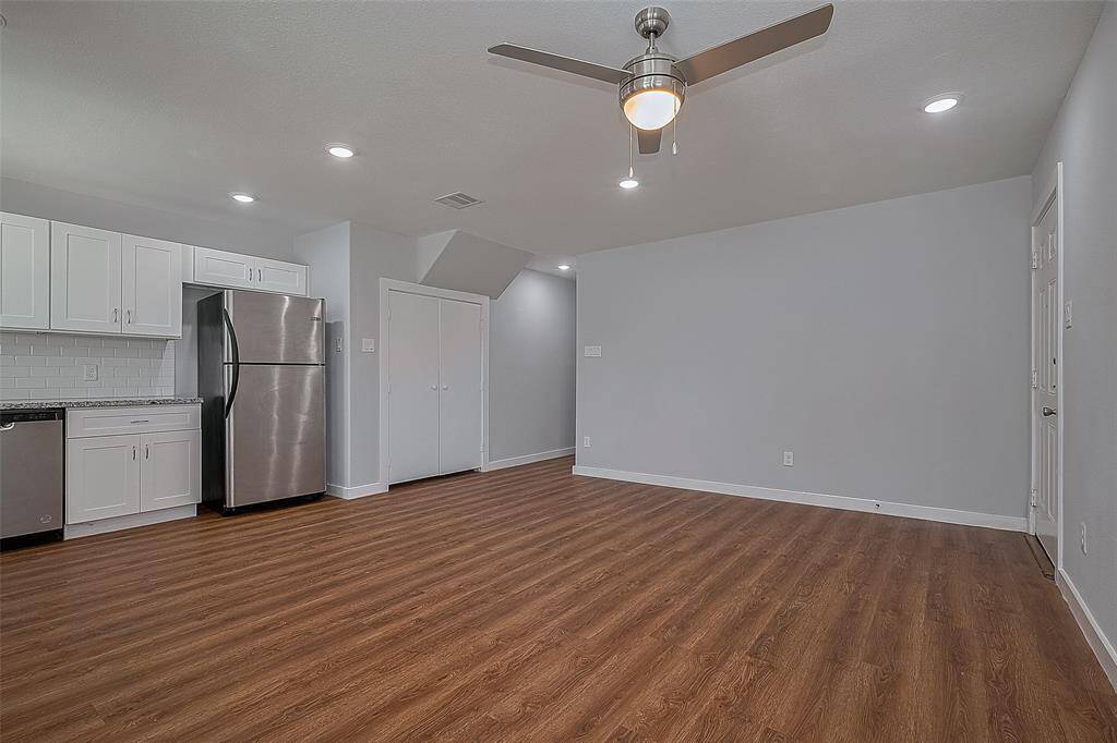 View from main living space to hallway to bedrooms.