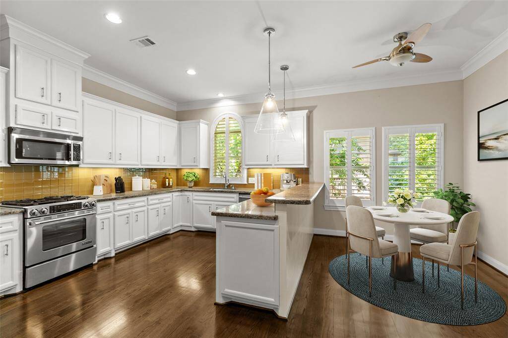 The kitchen/breakfast room is virtually staged.