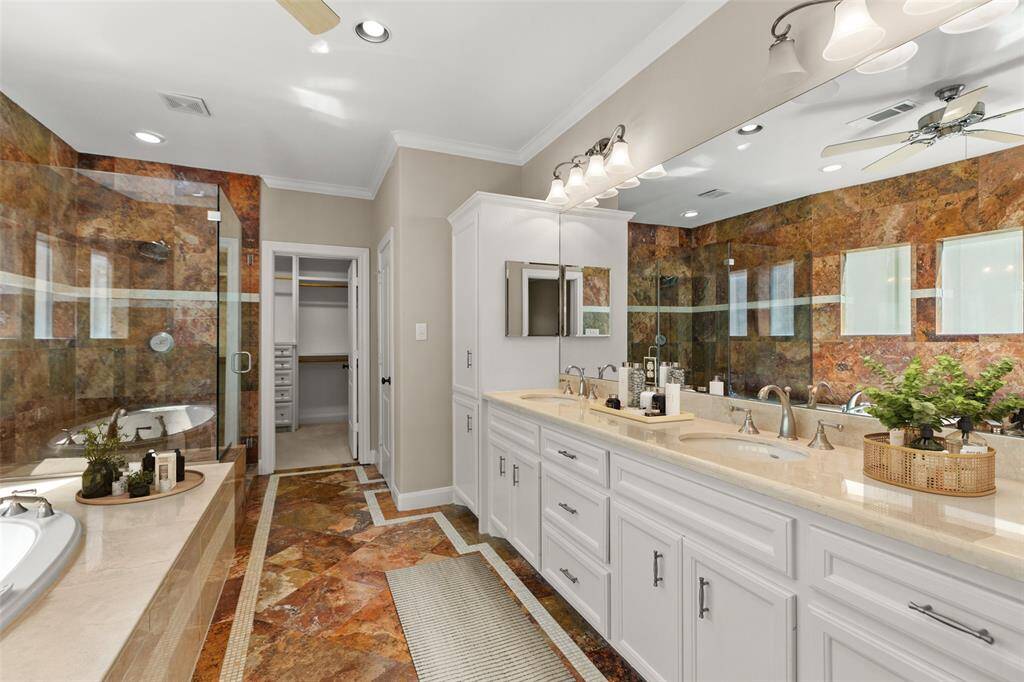 The primary bathroom is virtually staged.
