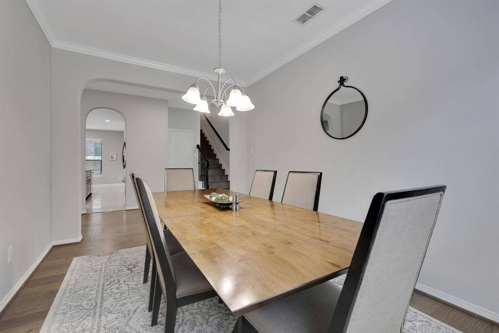 View of the dining room looking back towards the hall and kitchen.