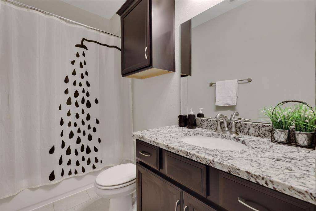 3rd full bathroom is located between the 3rd and 4th bedrooms.