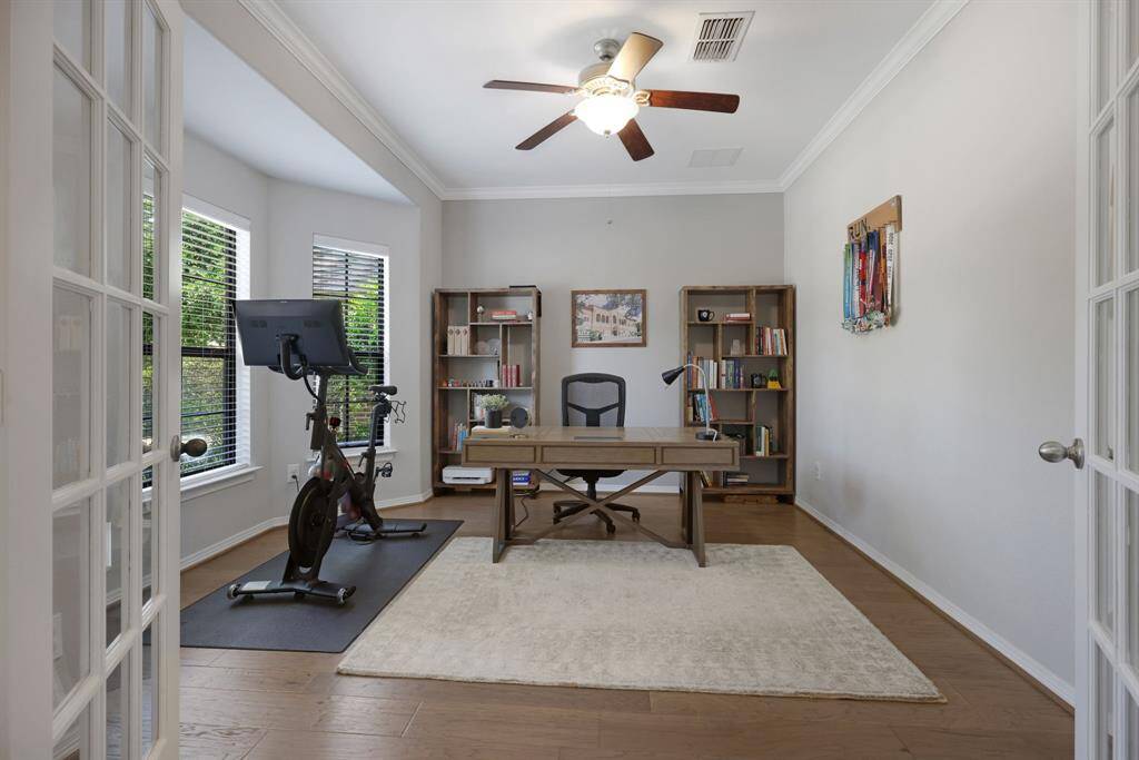 Office features large bay windows for additional light and space