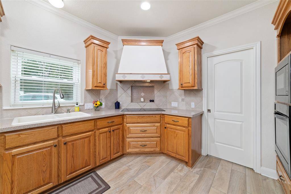 Kitchen with huge island with breakfast bar.