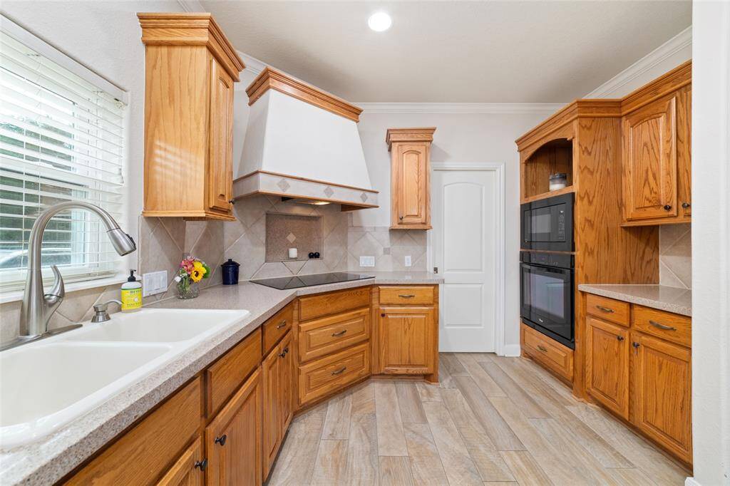 Kitchen with huge island with breakfast bar.