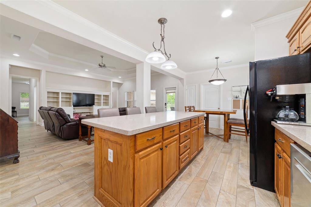 Kitchen with huge island with breakfast bar.