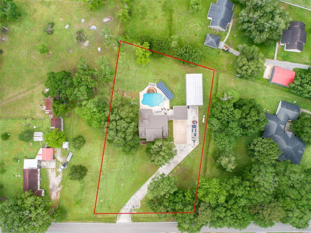 Tucked away on 1.5 serene acres in Manvel, this distinctive property is built for the way you want to live. The flexible floorpan allows between 4 to 6 bedrooms, 2.5 baths, a 2-car garage, in-ground pool, plus a 60'x30' insulated shop.