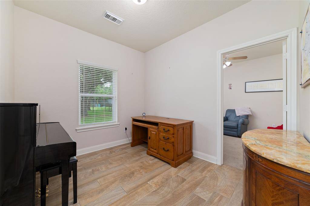 Piano/flex room between bedrooms 3 & 4.