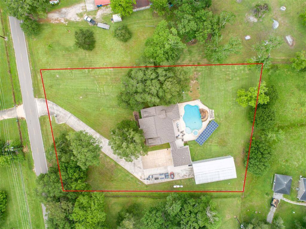 Tucked away on 1.5 serene acres in Manvel, this distinctive property is built for the way you want to live. The flexible floorpan allows between 4 to 6 bedrooms, 2.5 baths, a 2-car garage, in-ground pool, plus a 60'x30' insulated shop.