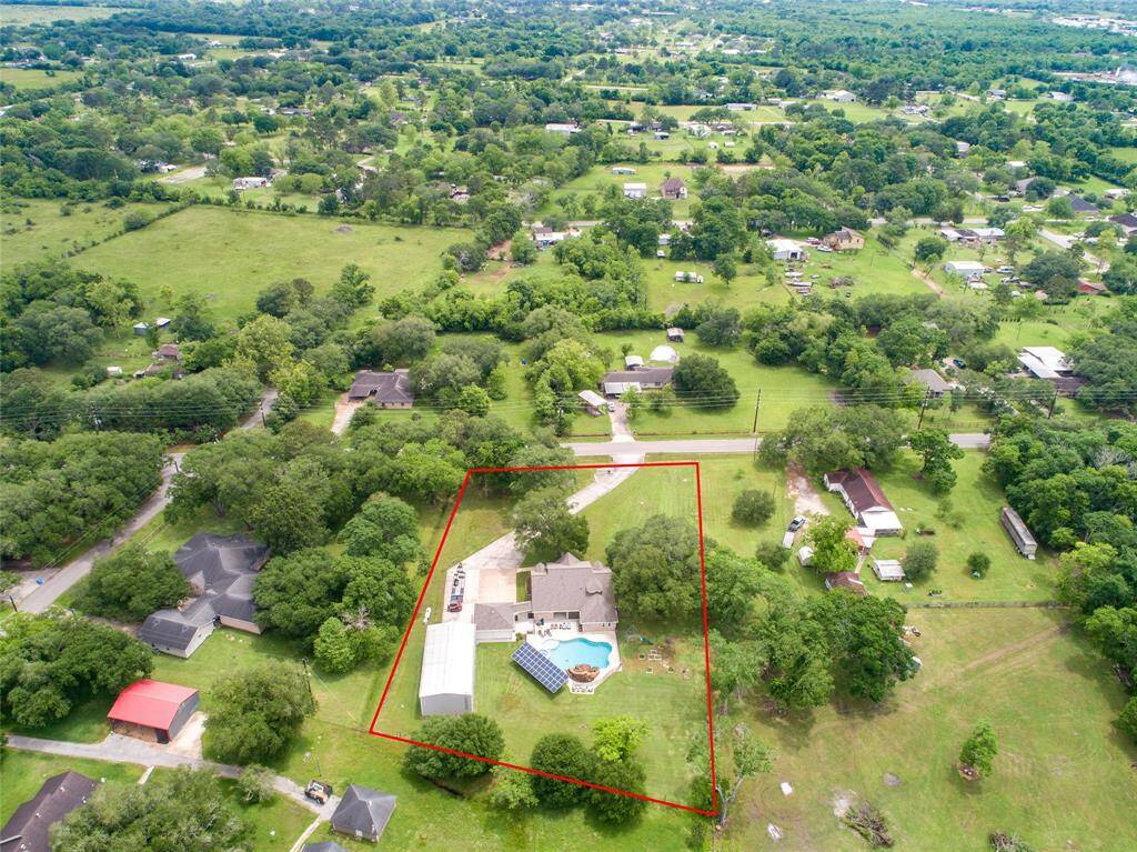 Tucked away on 1.5 serene acres in Manvel, this distinctive property is built for the way you want to live. The flexible floorpan allows between 4 to 6 bedrooms, 2.5 baths, a 2-car garage, in-ground pool, plus a 60'x30' insulated shop.