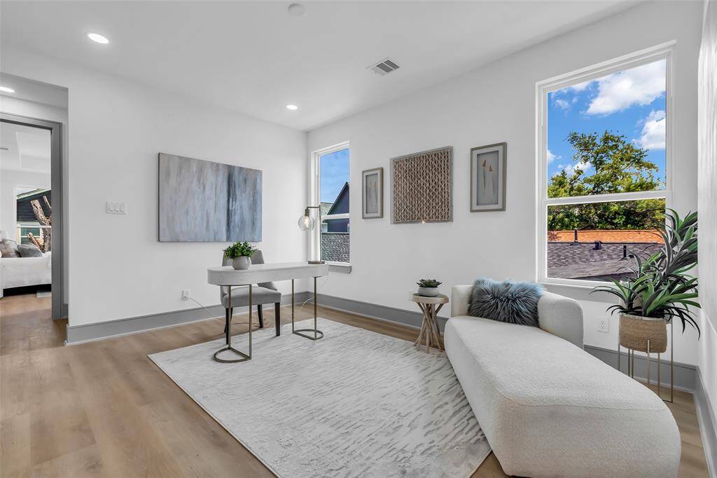 This flex space sits between the primary and guest bedrooms and can be used as a game room or lounge area.