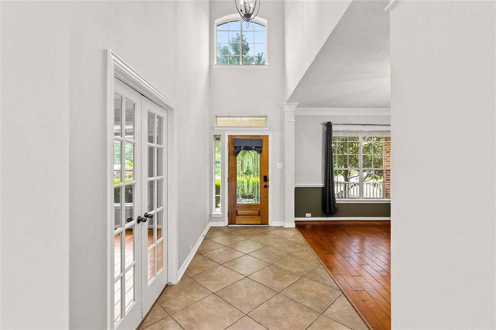 Study with French doors on the left and formal dining on the right