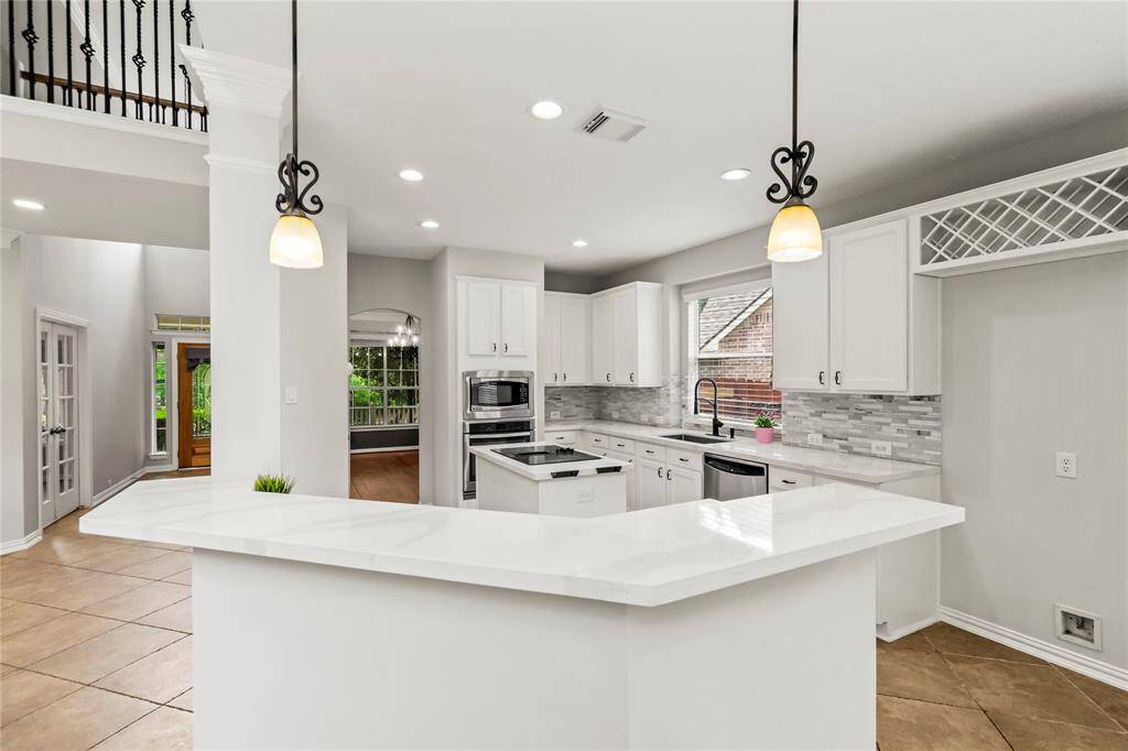Chef’s kitchen open to family room