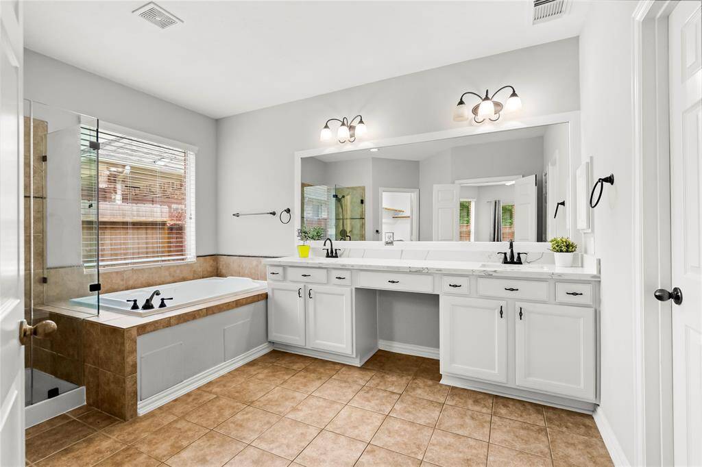 Double sinks and sitting bench