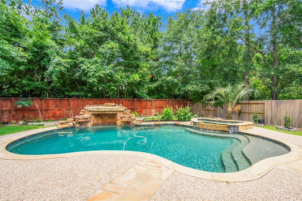 Backyard oasis with pool, spa and waterfall