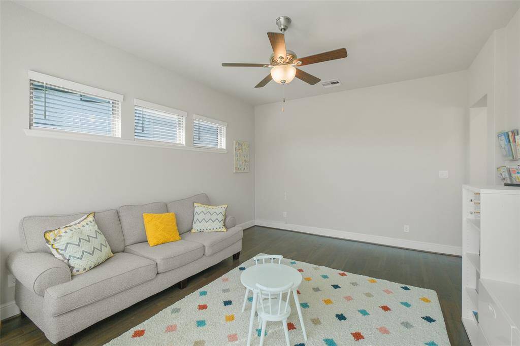 Downstairs gameroom/playroom right off the kitchen. One word: Convenient
