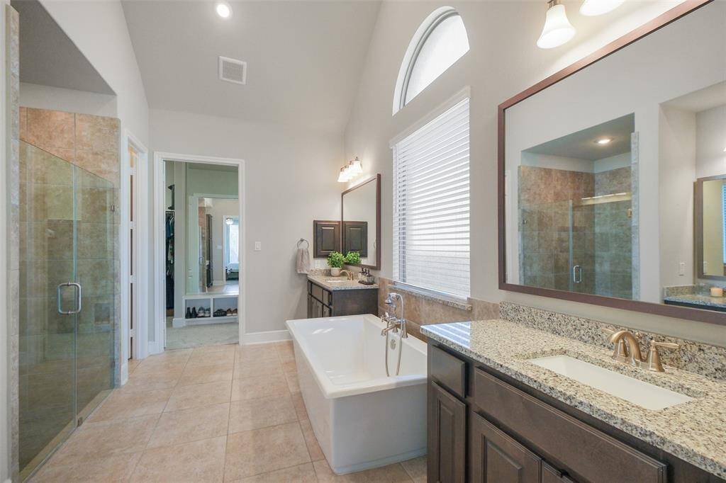 Dual sinks, with a huge shower AND Bath