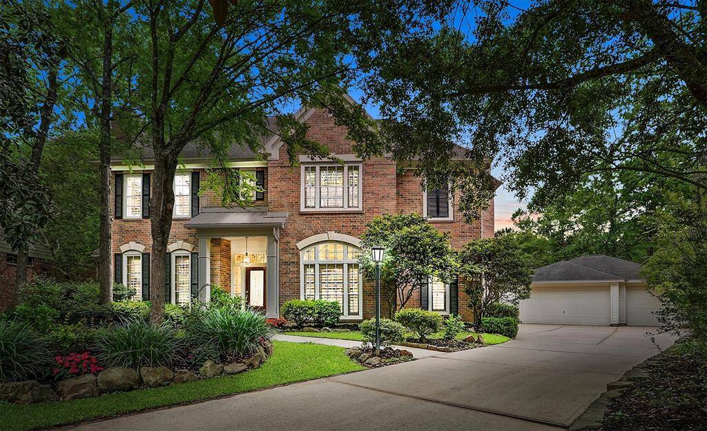 Welcome to 71 Ivory Moon Place, nestled in the trees on an oversized cul de sac lot, located in the highly sought after neighborhood of Chandler Creek.