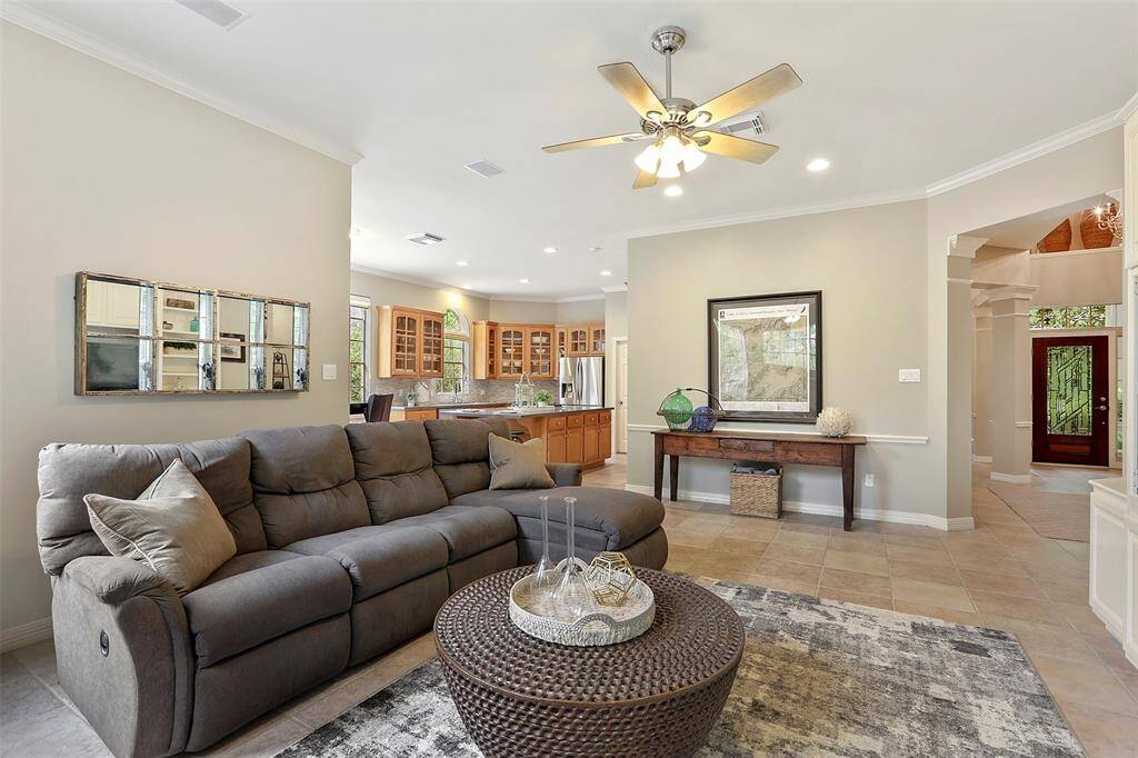 A look from the back of the family room toward the kitchen shows the great open floor plan suitable for today's lifestyle.
