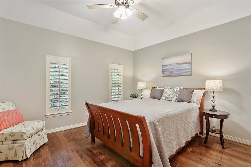 The guest bedroom. All of the secondary bedrooms are spacious with large closets! This bedroom has plantation shutters too!