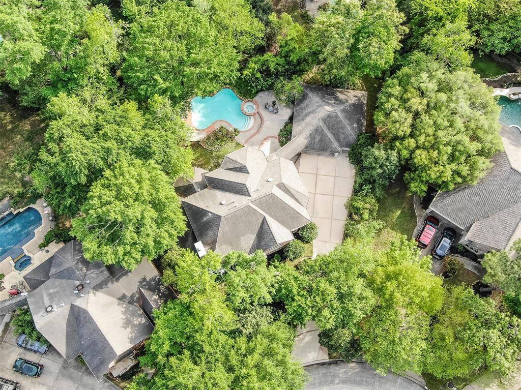 This overhead view shows the size and privacy of this lot! The driveway offers plenty of space for parking and the true three car garage is extended. The pool and patio are large enough to truly enjoy Texas summers!