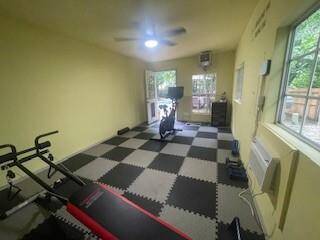 This air conditioned room serves as a gym next to the pool.