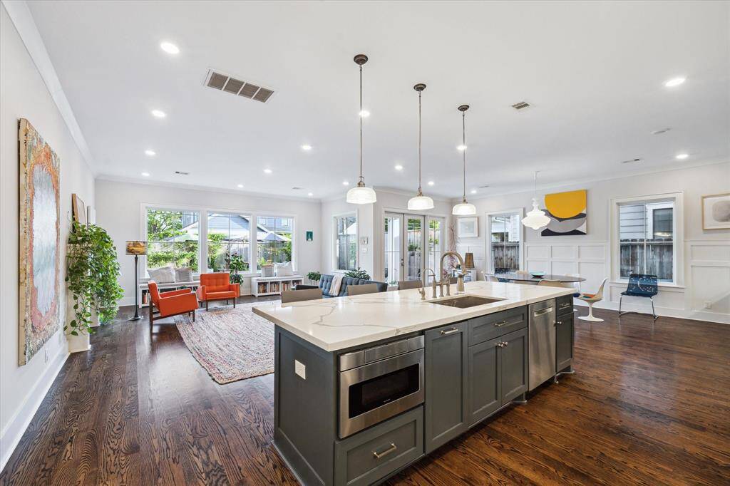 This expansive light-filled space connects kitchen, dining and living areas - perfect for entertaining!