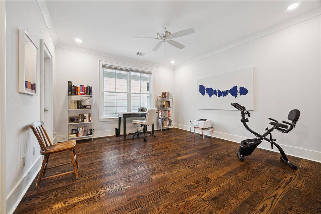 This bedroom is currently styled as an office and workout area - offering flexibility for work, wellness or restful reatreat with an en-suite bath.