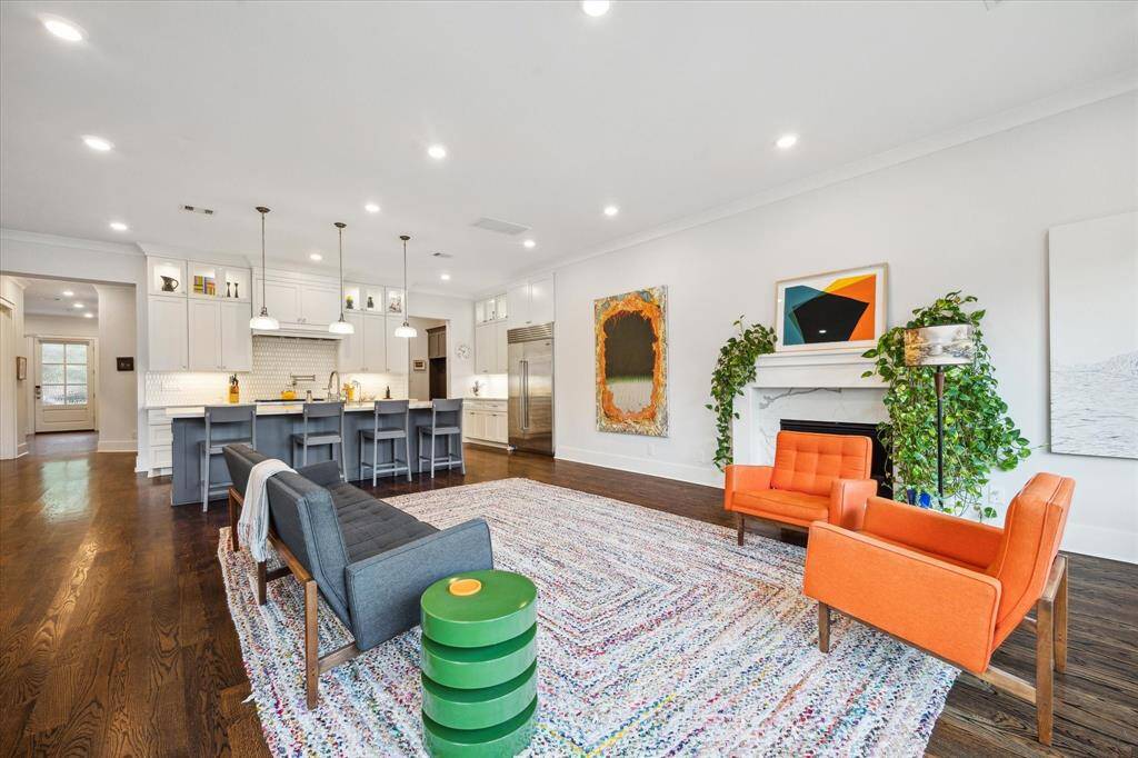 The living room offers a vibrant space where art, color and conversation can flow freely.
