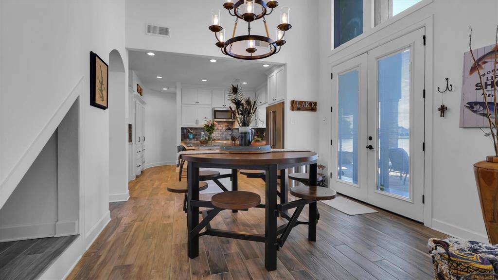 The nook under the staircase, located in the left of this picture, provides additional storage space or even a cozy retreat for your animals.