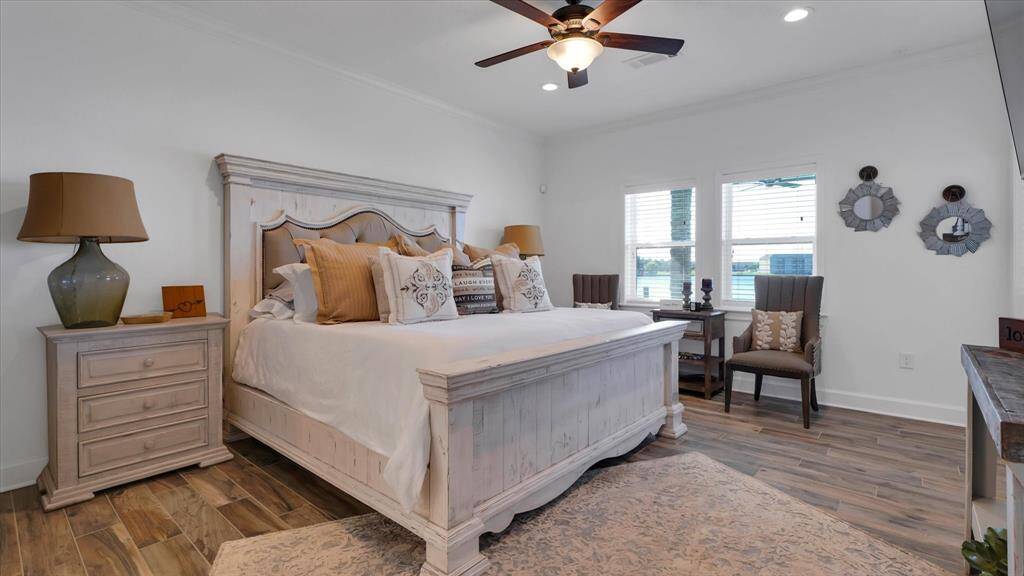 From the primary bedroom, you also have a view of the lake and can enjoy the relaxing lake vibes it provides.