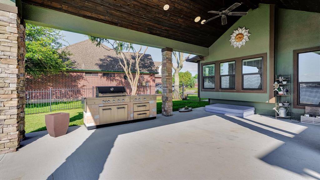 Spacious porch perfect for grilling, chilling, and fulfilling your outdoor entertaining dreams.