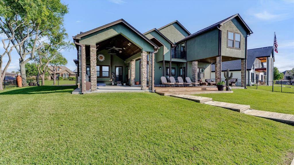 Blue skies, lush green grass and soothing sounds of the lake provide the perfect relaxing afternoon right in your own backyard.