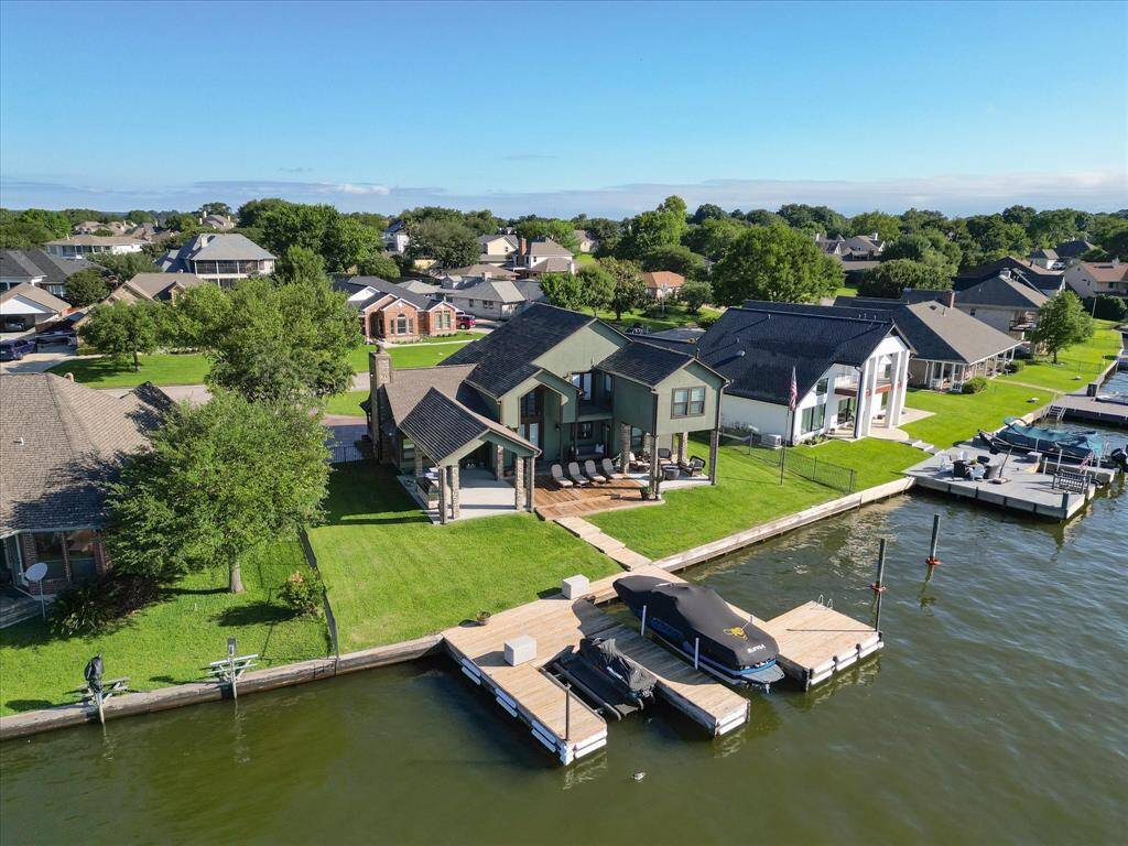 Embrace lakeside luxury with private docks for your boat and jet skis. Two jet ski's to be included with the sale!!