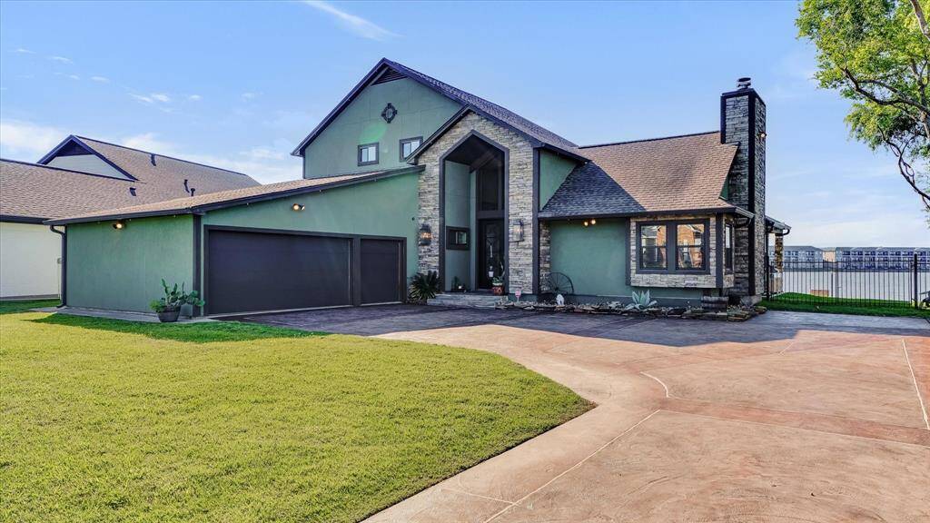 Plenty of room for parking on this stamped stained concrete driveway.
