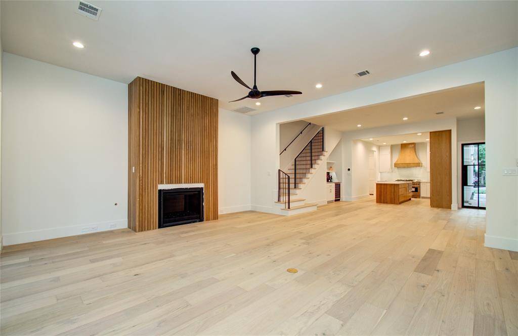 Living room *Photos from a previous home by the same developer, selections and floor plans may vary.*