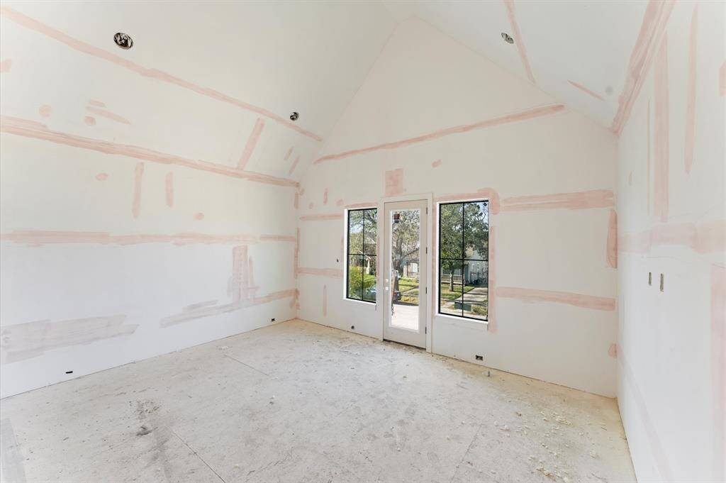 Primary bedroom offers private balcony, cathedral ceilings and plenty of natural light. *Photos taken in mid-March.*