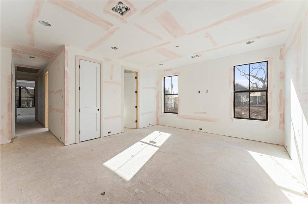 Game room/optional 4th bedroom opens to dual access bathroom. *Photo taken in mid-March*