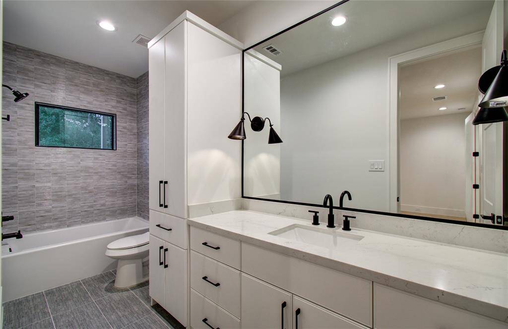 Bath 3 *Photos from a previous home by the same developer, selections and floor plans may vary.*