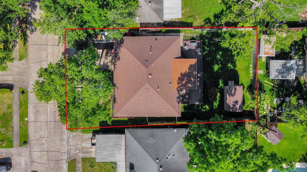 Situated on an oversized lot, this property offers an abundance of outdoor space with a lush lawn and mature landscaping. The extended driveway allows for easy guest parking, while the private backyard is ideal for entertaining, gardening, or simply relaxing under the trees.
