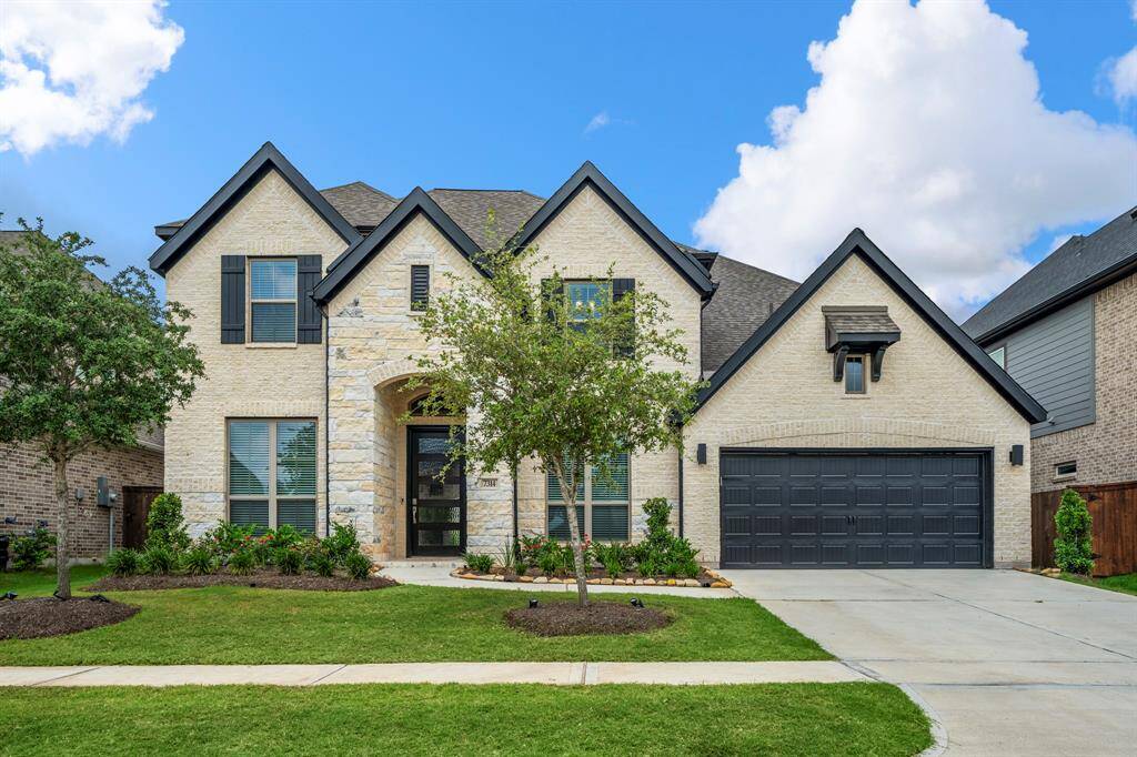 Welcome home to 7314 Autumn Sage! This stunning 2 story home welcomes you with sensational curb appeal, lush landscaping, and a well-maintained yard. It features an elegant exterior with cream brick and stone, contrasting dark trim, and a spacious 3 car garage!