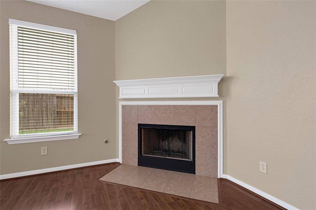 Elegant open layout with defined formal dining space and stunning crown molding details.