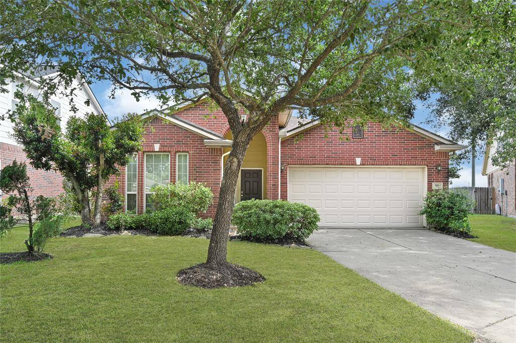 Charming curb appeal with mature shade trees and fresh landscaping - Welcome Home!