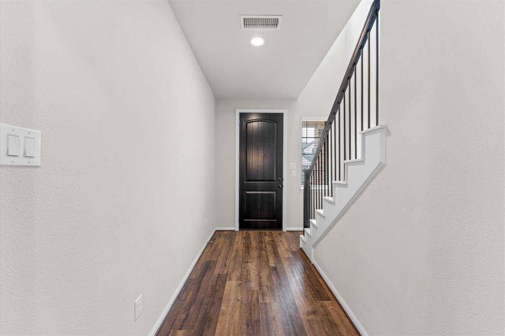 Step inside to a welcoming foyer that sets the stage for the home's inviting ambiance.