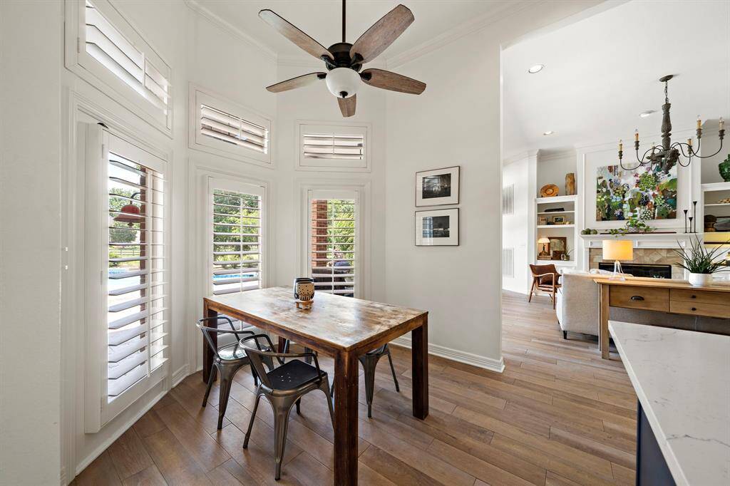 The breakfast area features bay windows complete with shutters and oasis views.