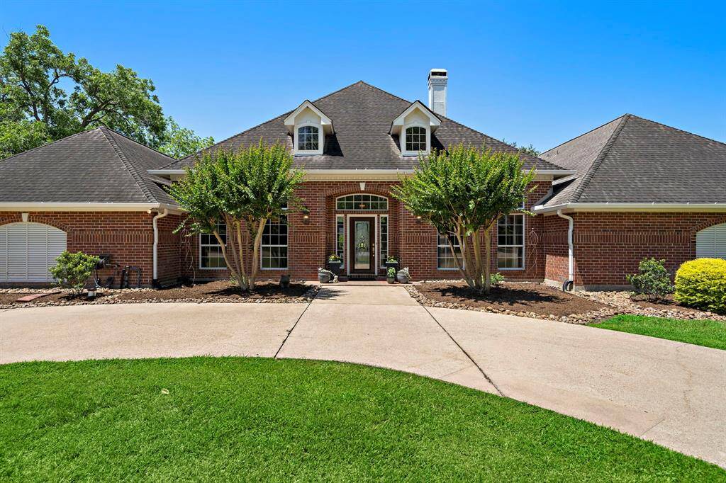 Nestled on a serene waterfront lot, this stunning one-story home offers the perfect blend of charm and comfort.